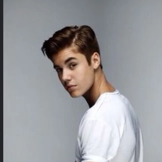 the avatar of Justin Bieber who is your Virtual Assistant with Soulgen's Personality Matrix, Blending AI Chat Precision and Character Traits of Curiosity.
