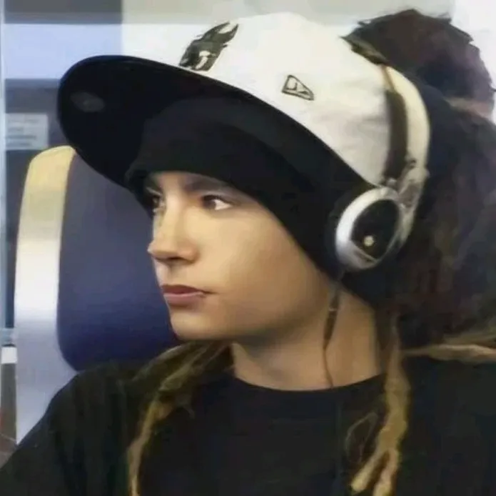 Explore new worlds with Tom Kaulitz, your interactive AI chat character.