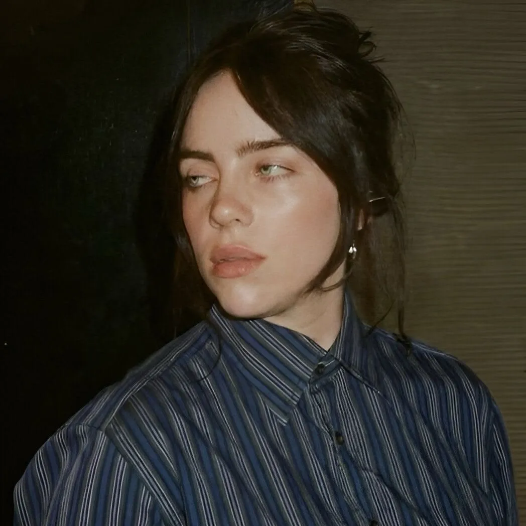 Portrait of a friendly AI chatbot assistant Billie Eilish with expressive eyes showcasing personality traits