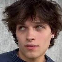 Chris Sturniolo: Interactive AI chatbot mascot for random chat and community-driven roleplay