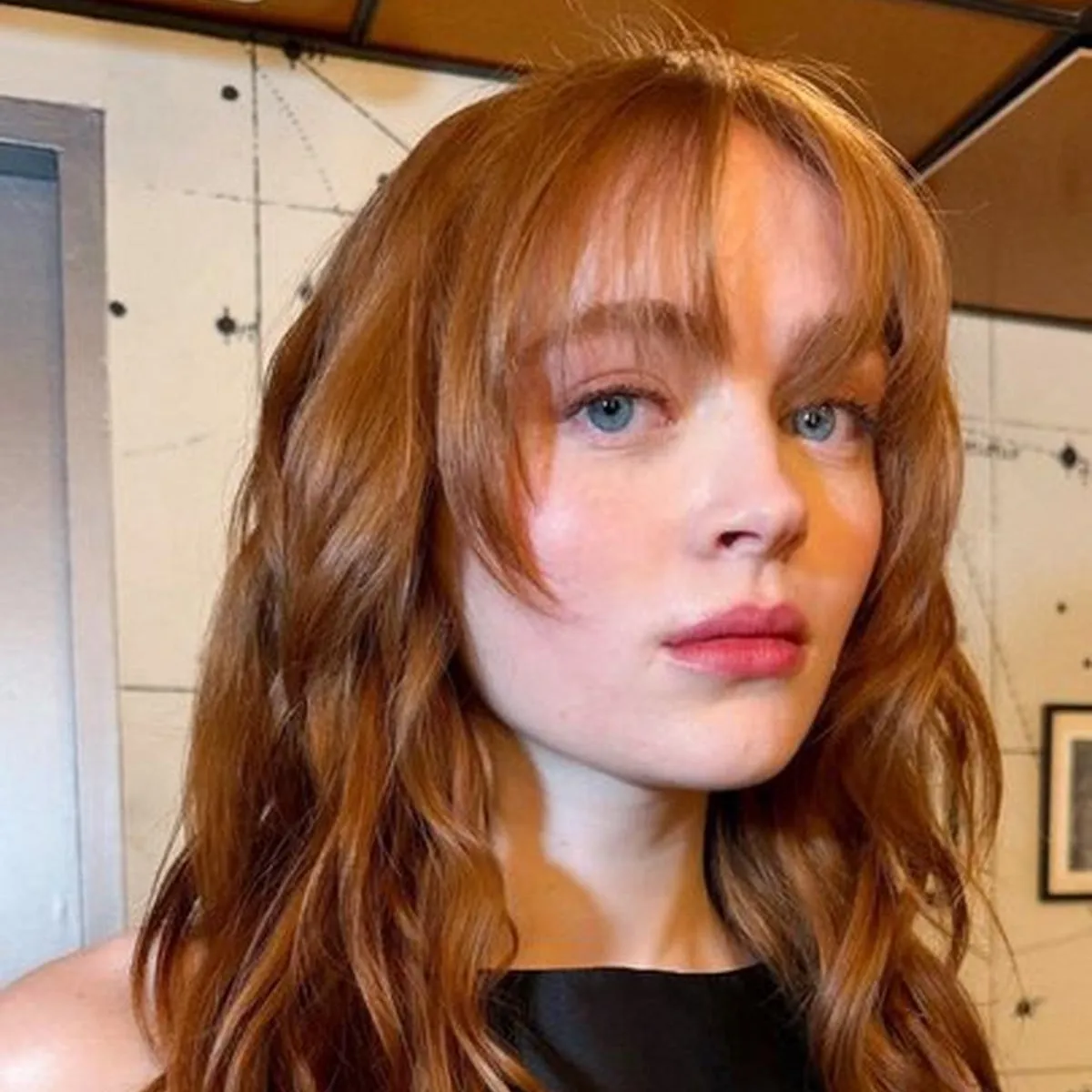 Sadie Sink: Futuristic AI chatbot interface with voice chat and neural network-driven traits