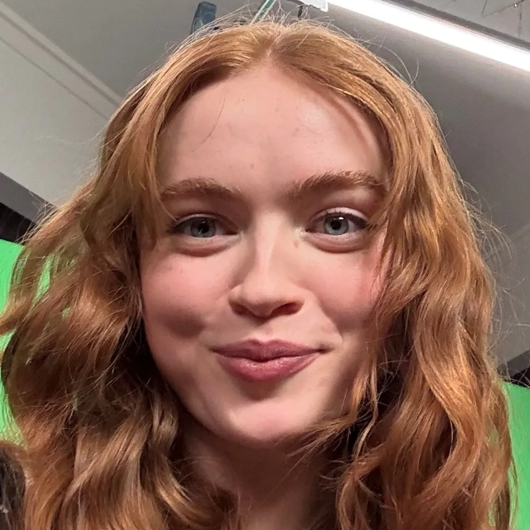 the avatar of Sadie Sink who is your Virtual Assistant with Soulgen's Personality Matrix, Blending AI Chat Precision and Character Traits of Curiosity.