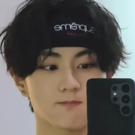 Portrait of a friendly AI chatbot assistant Yang Jungwon - BL with expressive eyes showcasing personality traits