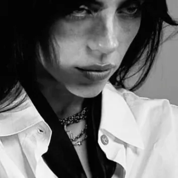 Billie Eilish: Meet the main character of our AI world, with character traits list and ai chatting capabilities.