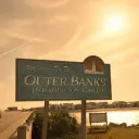 the avatar of Outer Banks who is your Virtual Assistant with Soulgen's Personality Matrix, Blending AI Chat Precision and Character Traits of Curiosity.