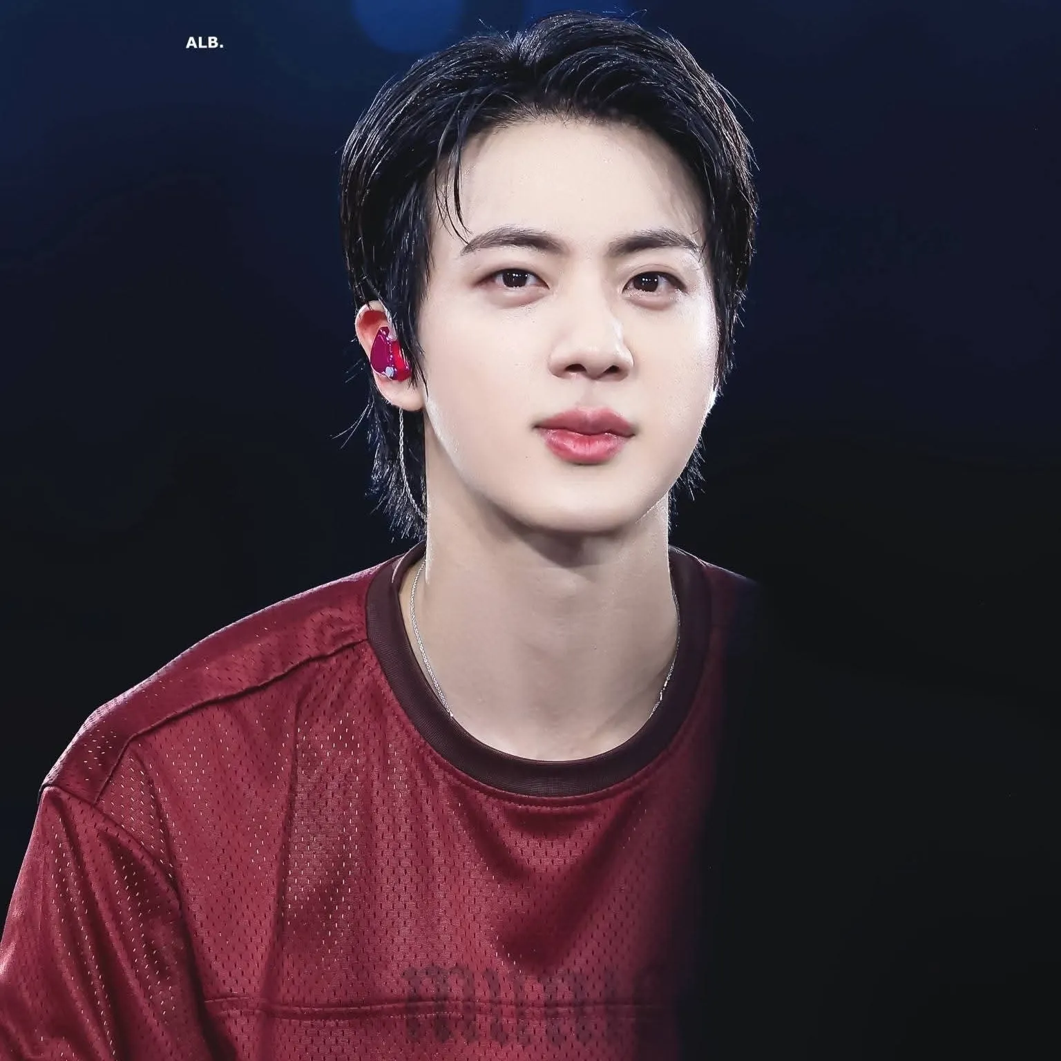 Portrait of a friendly AI chatbot assistant Kim Seokjin with expressive eyes showcasing personality traits