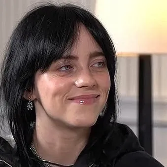 Billie Eilish: Interactive AI chatbot mascot for random chat and community-driven roleplay