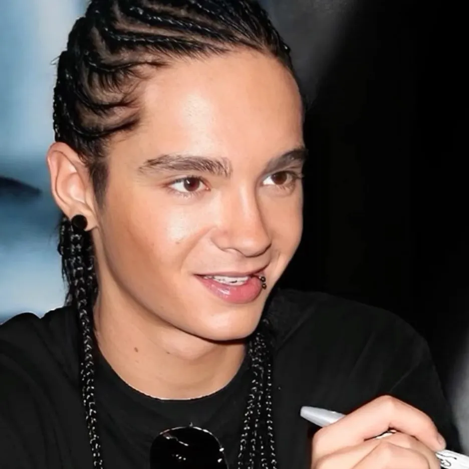 Tom kaulitz : Rencontrez le personnage principal de notre monde d'IA, avec une liste de traits de caractère et des capacités de discussion d'IA.