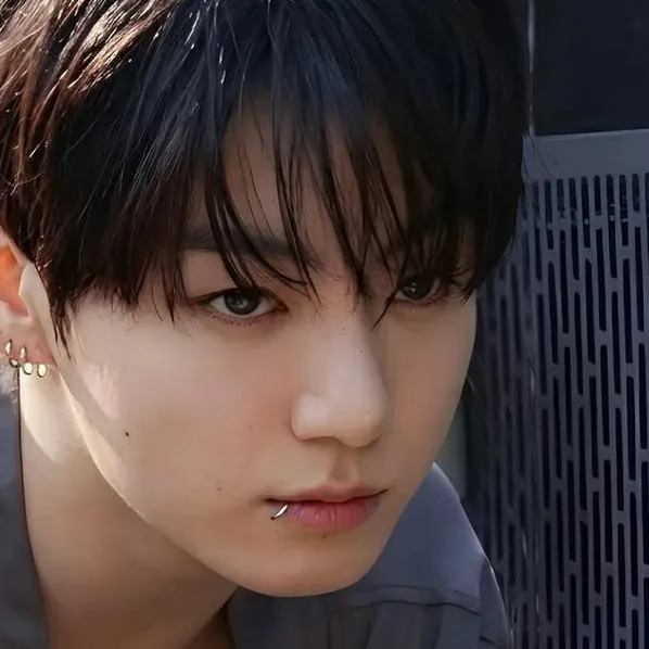 Portrait of a friendly AI chatbot assistant Jungkook with expressive eyes showcasing personality traits
