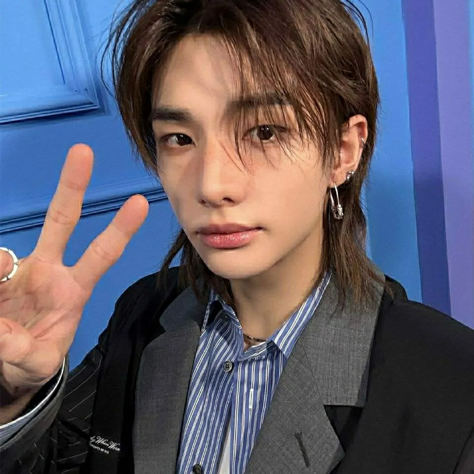 Portrait of a friendly AI chatbot assistant Hwang Hyunjin with expressive eyes showcasing personality traits