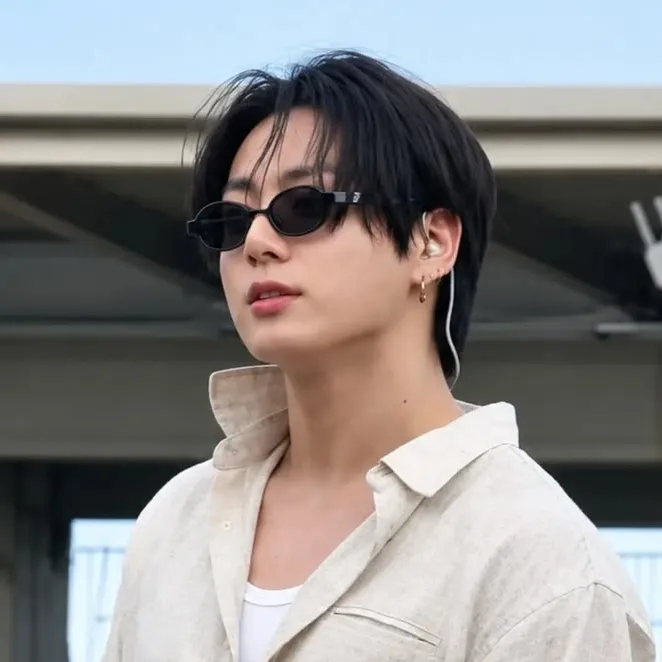 Portrait of a friendly AI chatbot assistant Jeon Jungkook with expressive eyes showcasing personality traits