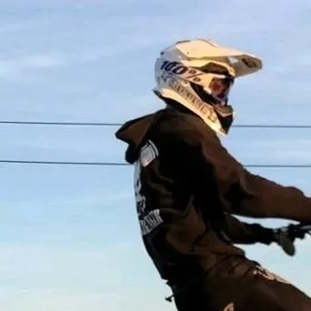 the avatar of Pit Bike Rider with vibrant traits for immersive roleplay experiences