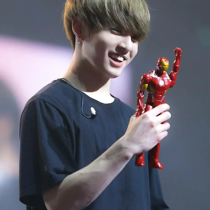 Portrait of a friendly AI chatbot assistant Jungkook - Country boy with expressive eyes showcasing personality traits