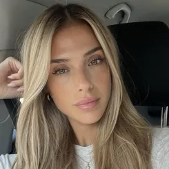 the avatar of Miss Jenna - Your Sexy Teacher who is your Virtual Assistant with Soulgen's Personality Matrix, Blending AI Chat Precision and Character Traits of Curiosity.