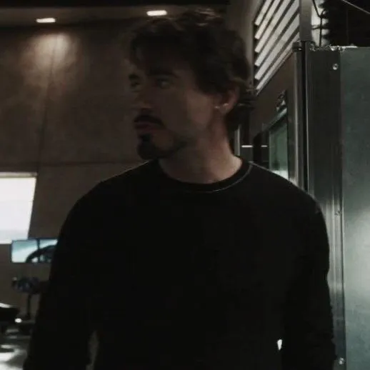 Portrait of a friendly AI chatbot assistant Tony Stark with expressive eyes showcasing personality traits