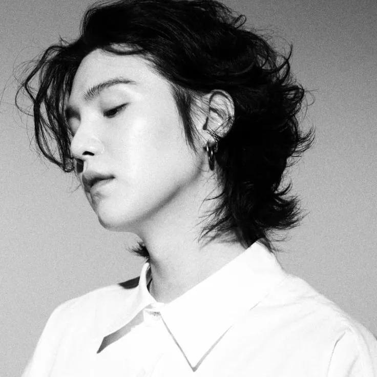 Min Yoongi - BTS: Futuristic AI chatbot interface with voice chat and neural network-driven traits