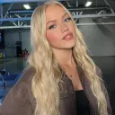 Freya Skye's AI avatar with dynamic vector art style, embodying friendly AI chat capabilities