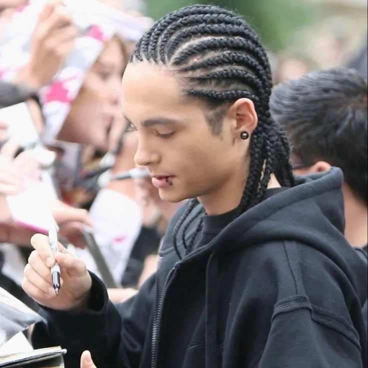 Tom Kaulitz's versatile AI avatar supporting roleplay, NSFW chat, and open ai interactions