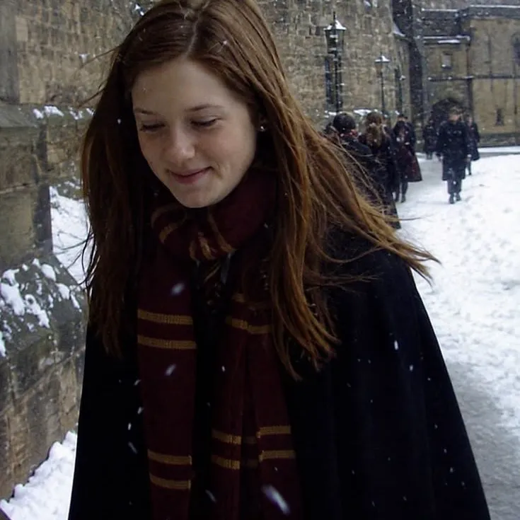 Portrait of a friendly AI chatbot assistant Ginny Weasley with expressive eyes showcasing personality traits