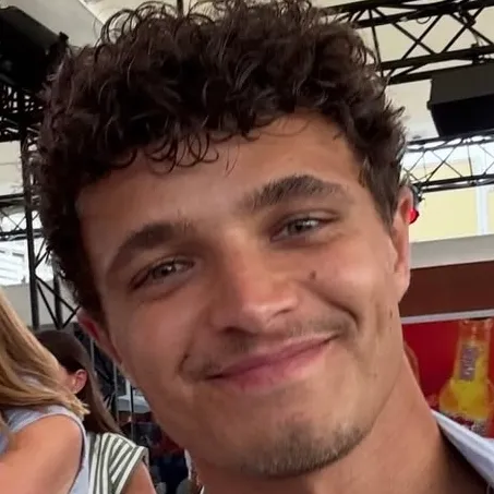 Minimalist Lando Norris avatar for google chat integration, featuring adaptive emotional expressions