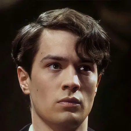 Avatar AI Tom riddle dengan gaya seni vektor dinamik, merangkumi keupayaan sembang AI yang mesra