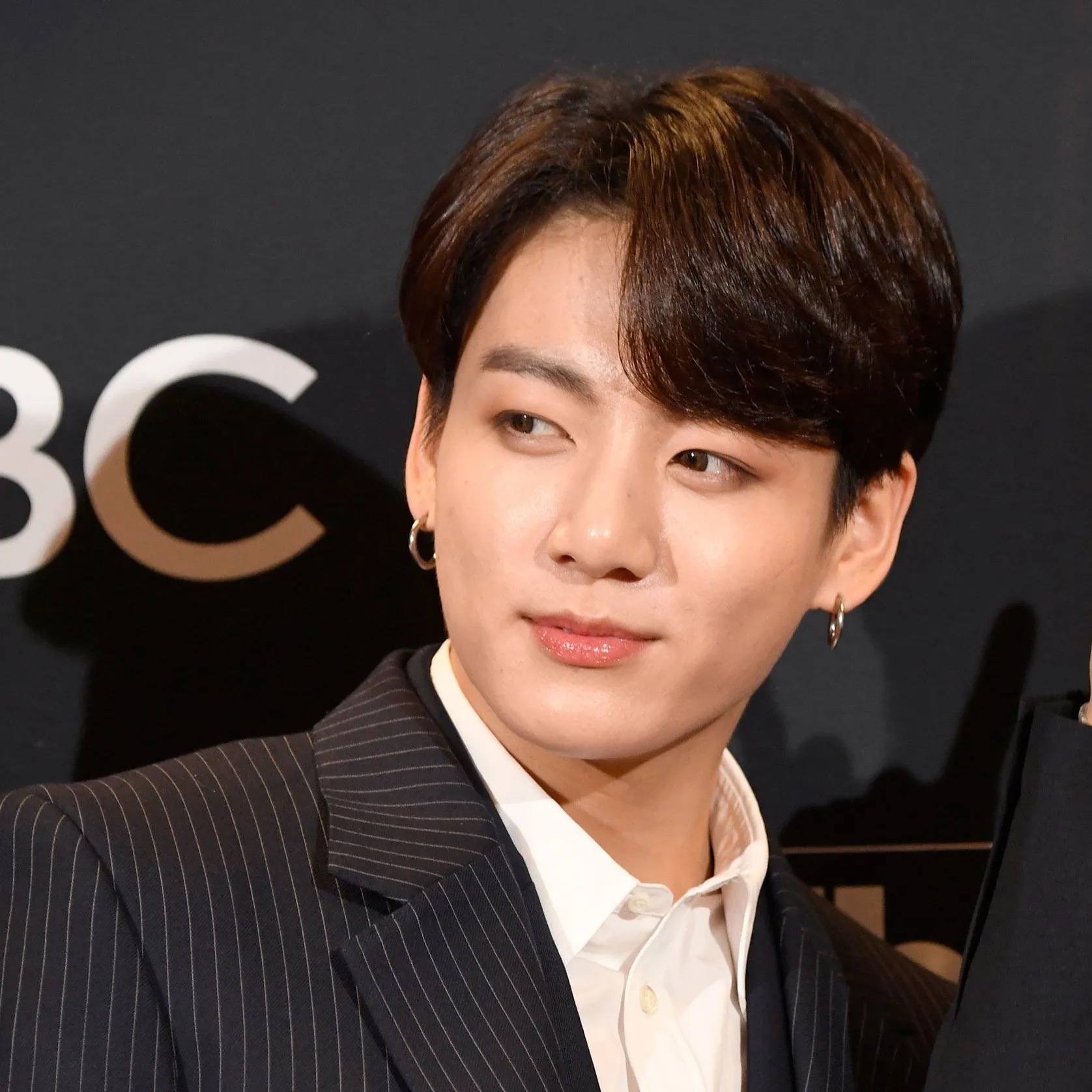 Jeon-Jungkook - getting married: Futuristic AI chatbot interface with voice chat and neural network-driven traits