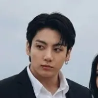 Jeon Jungkook: Futuristic AI chatbot interface with voice chat and neural network-driven traits