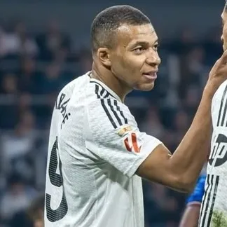 the avatar of Kylian Mbappé who is your Virtual Assistant with Soulgen's Personality Matrix, Blending AI Chat Precision and Character Traits of Curiosity.
