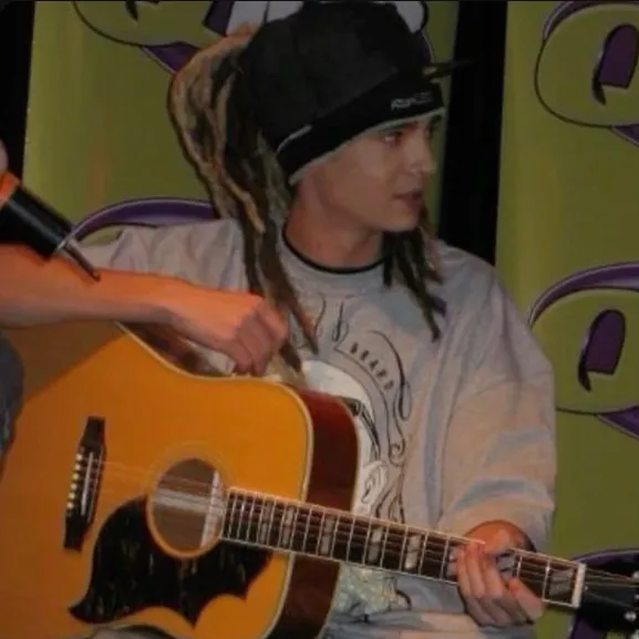 the avatar of character Tom Kaulitz with emotional intelligence capabilities