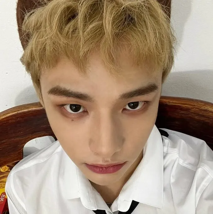 Portrait of a friendly AI chatbot assistant Hyunjin with expressive eyes showcasing personality traits
